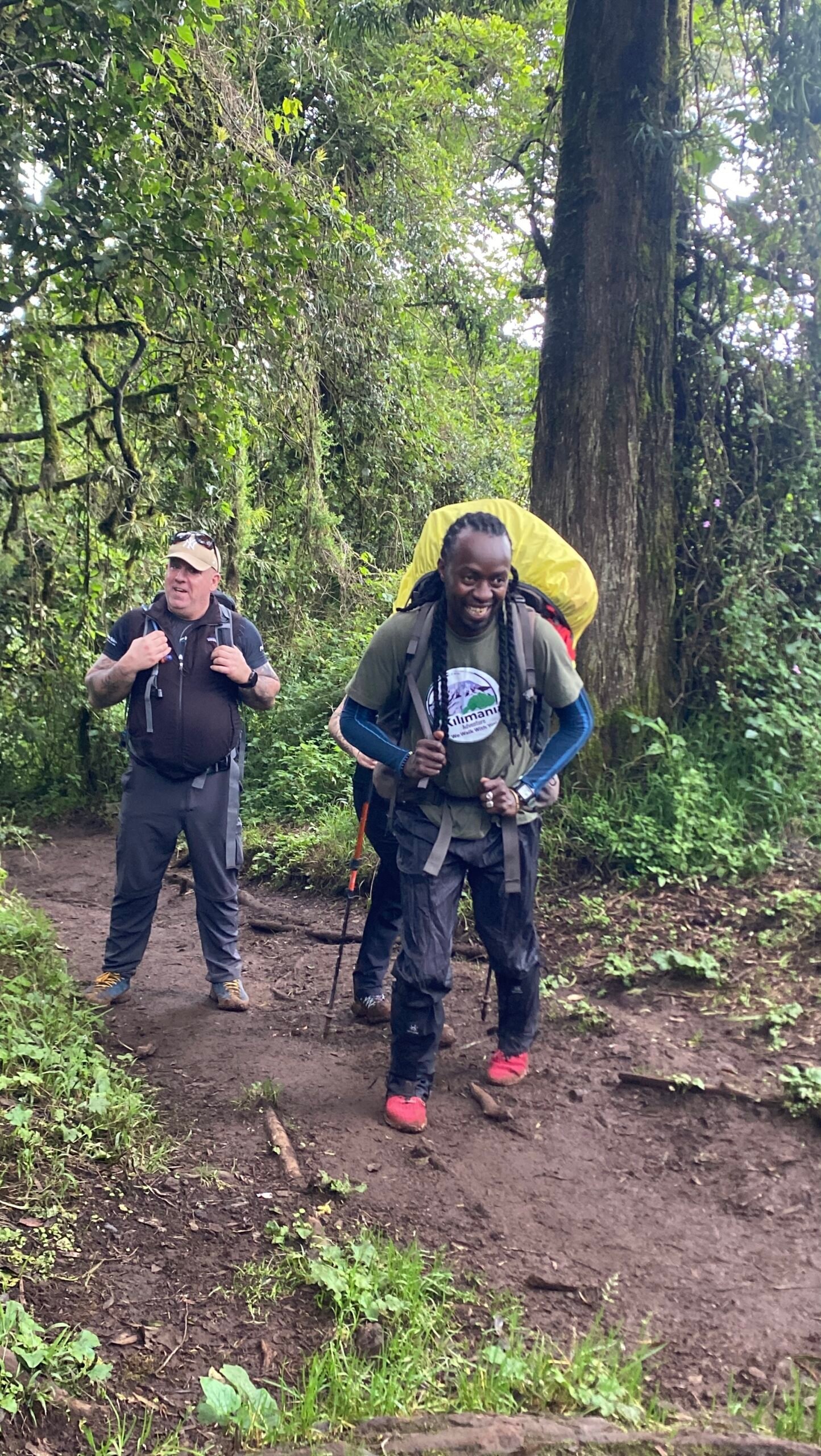 Kilimania expedition team at a Kilimanjaro high camp in clear daytime conditions