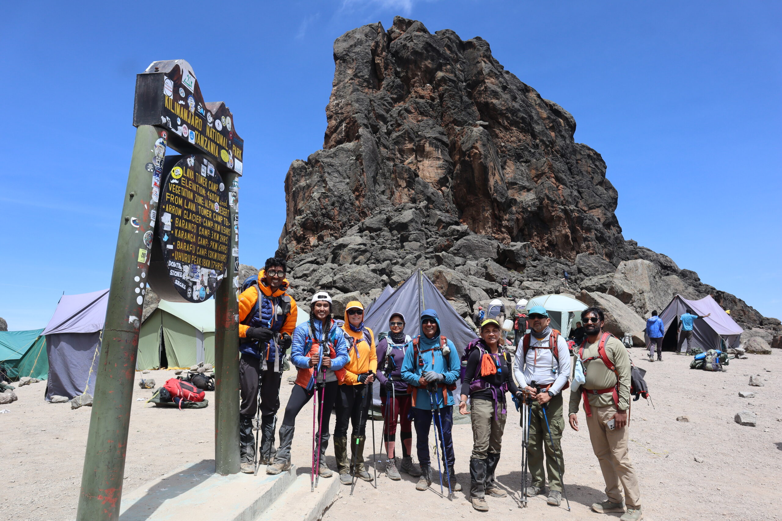 Climbers approaching the Lava Tower volcanic plug during the Lemosho Route acclimatization day
