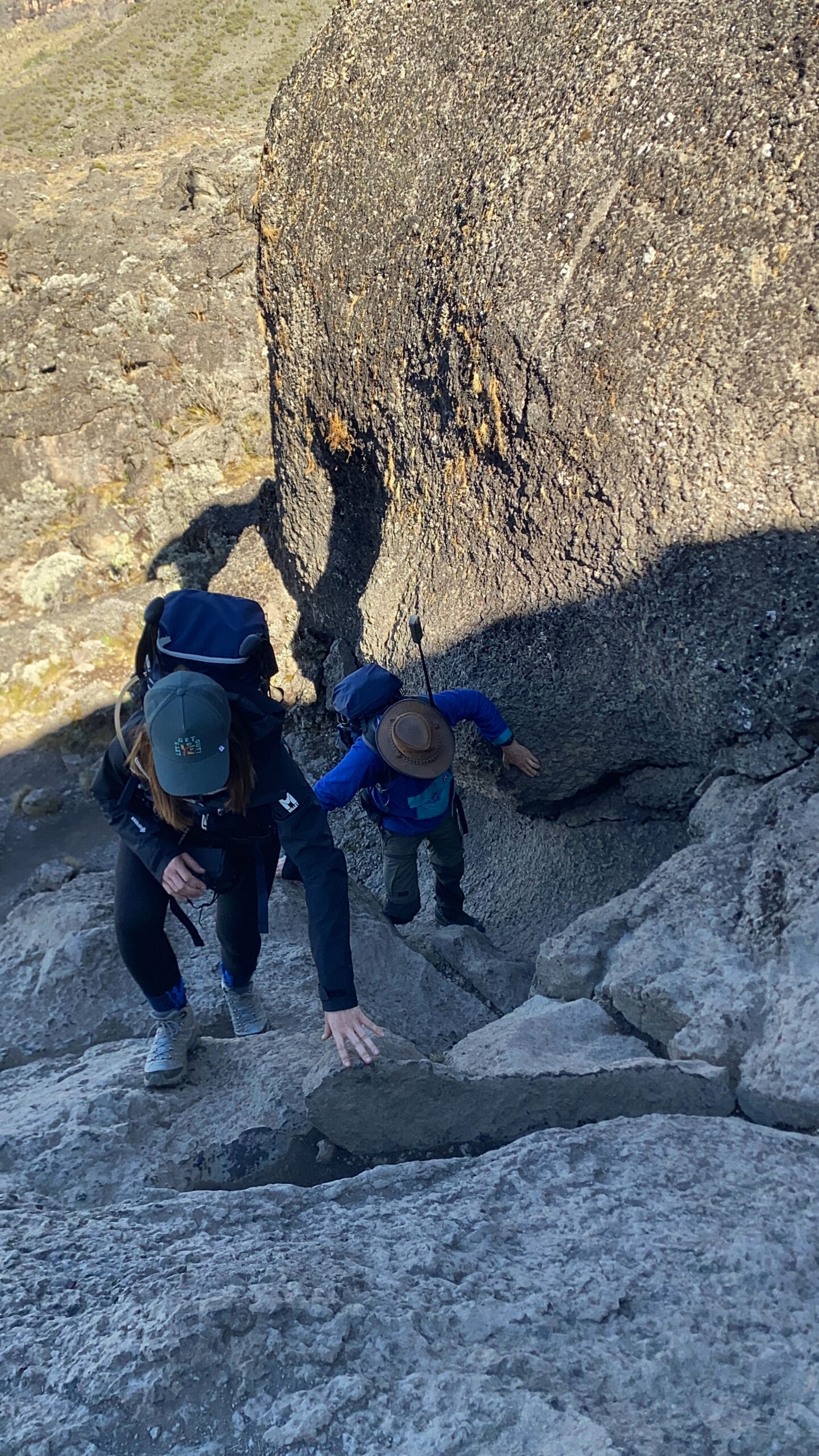 Climbers ascending the Barranco Wall on Mount Kilimanjaro