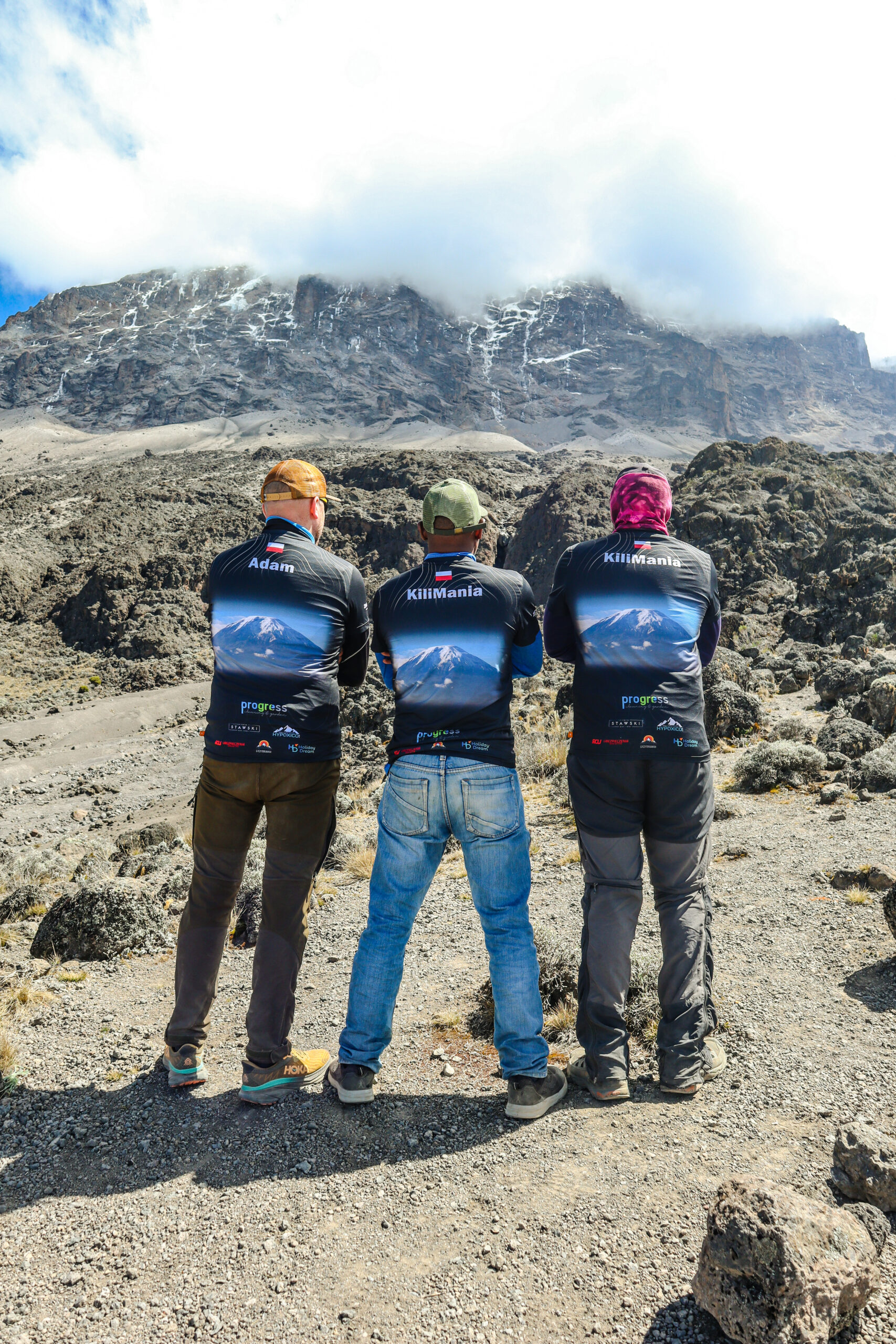 Sabinus Msimba, guide Izack Mlala and client Adam on Mount Kilimanjaro