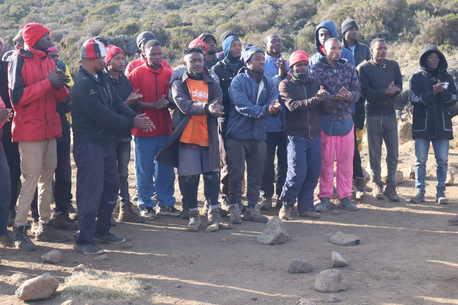 Sabinus Msimba and the Kilimania crew at a Kilimanjaro summit-week tipping ceremony with porters and guides