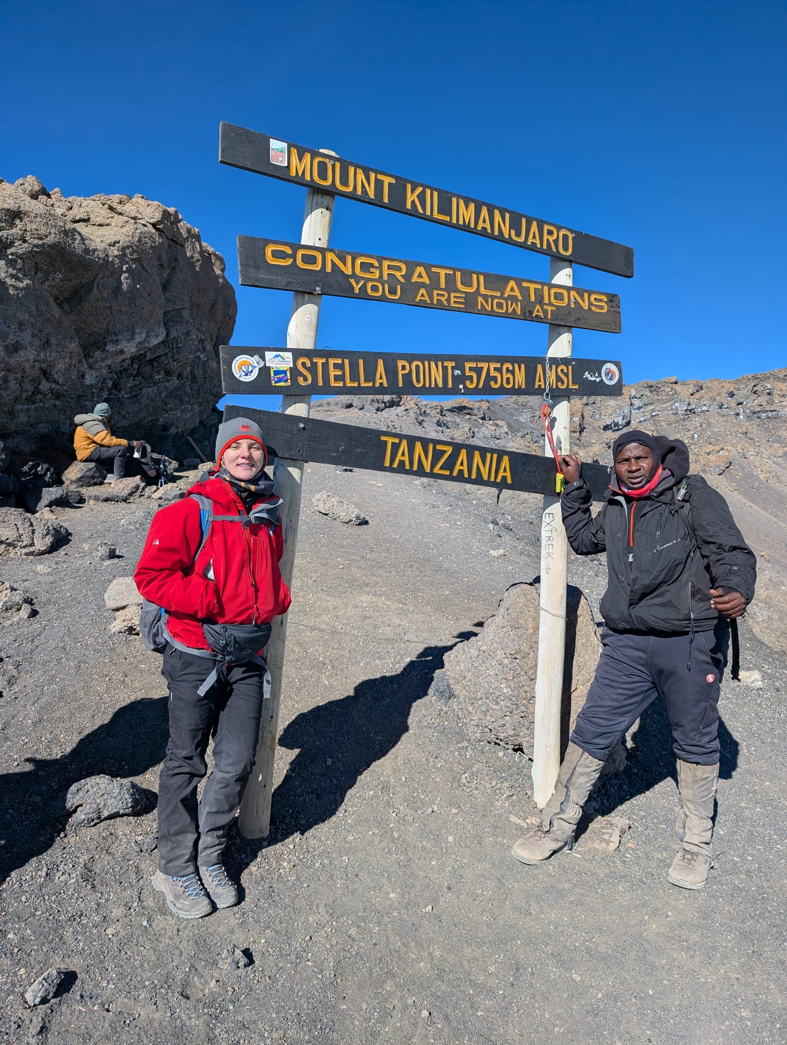 Senior Guide Sabinus Msimba and client from England at Stella Point