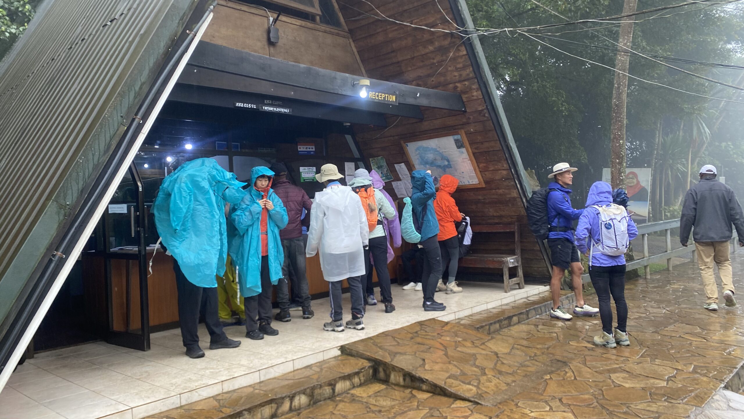 Climbers checking in at Marangu Gate reception before the climb to Mandara Hut on Kilimanjaro's hut route