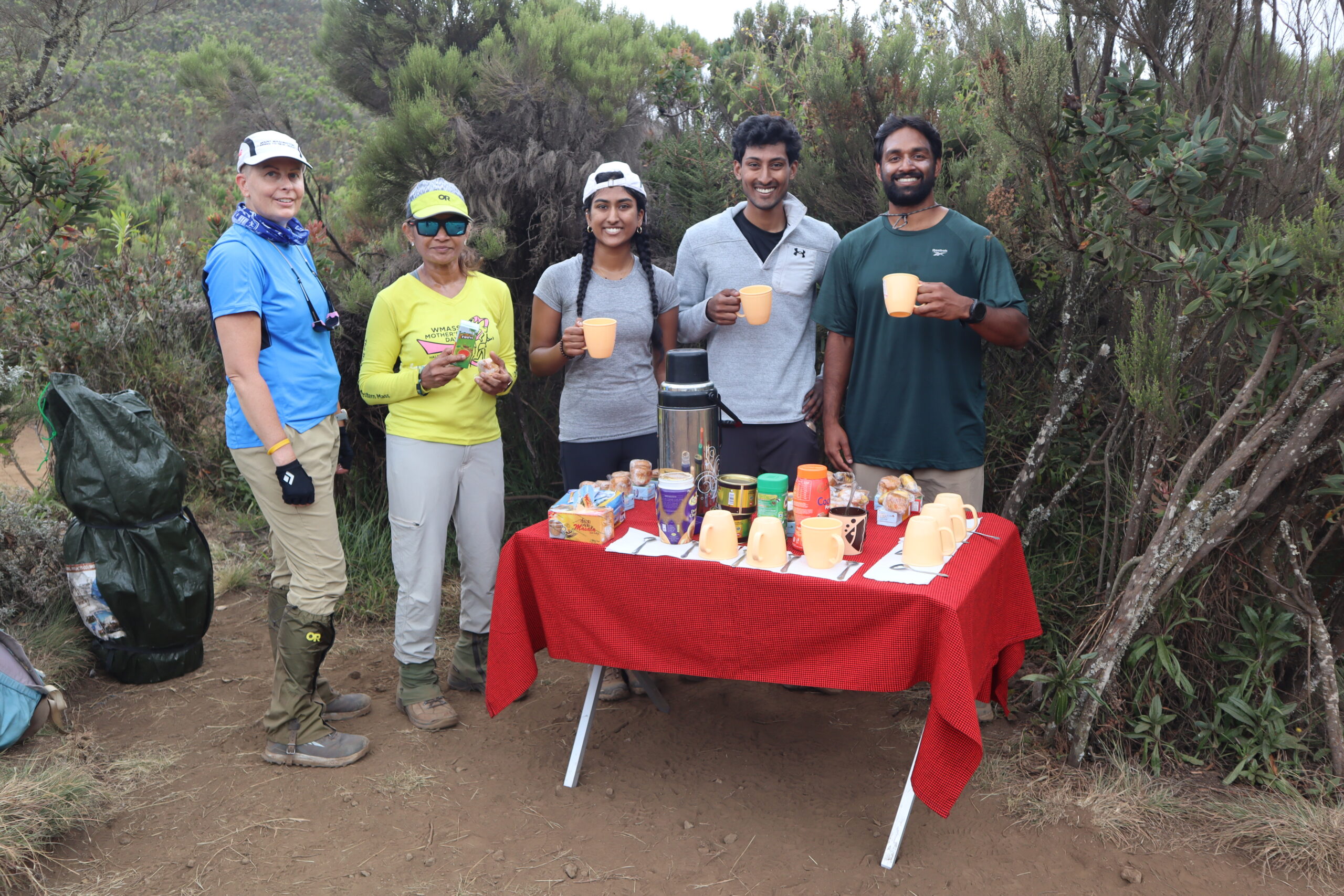 Climbers taking a tea break on the trail between Big Tree Camp and Shira One on the Lemosho Route