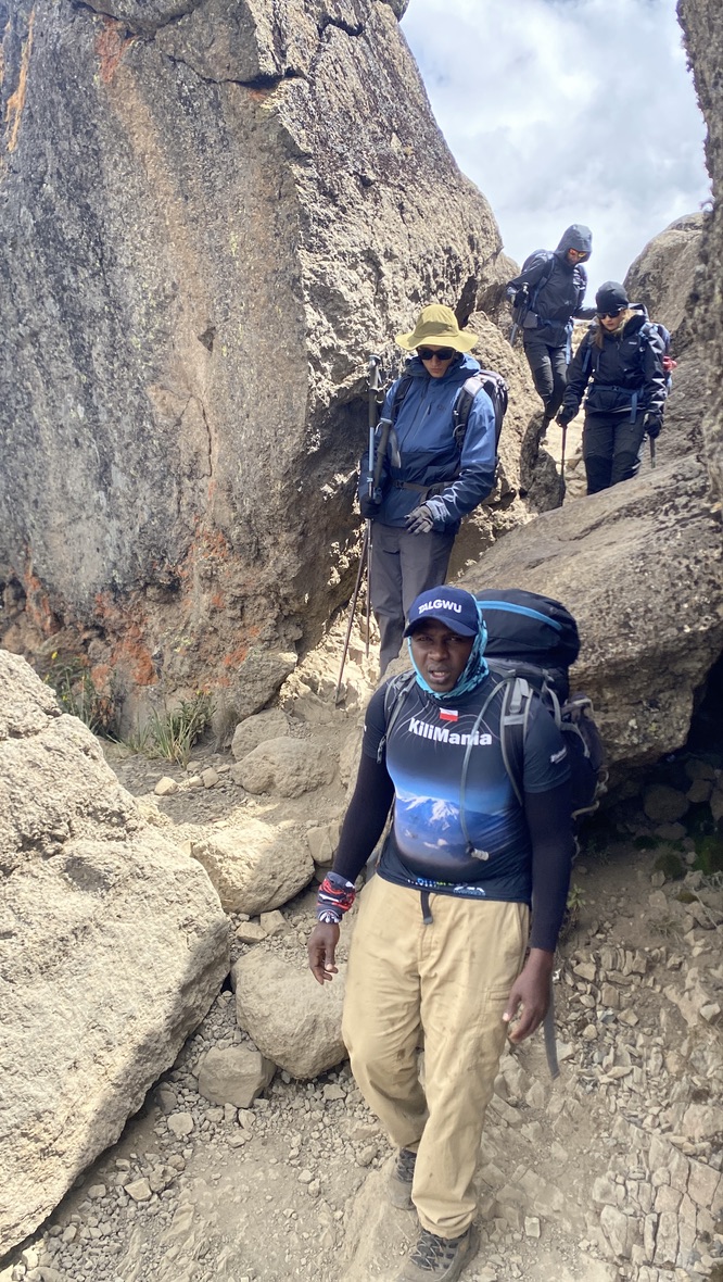 Sabinus Msimba leading a family group from Shira Camp to Lava Tower on Kilimanjaro