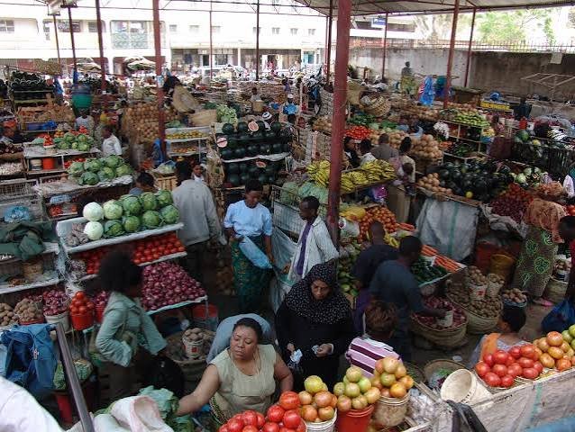 Fresh produce traders at stalls in the Central Maasai Market, Arusha