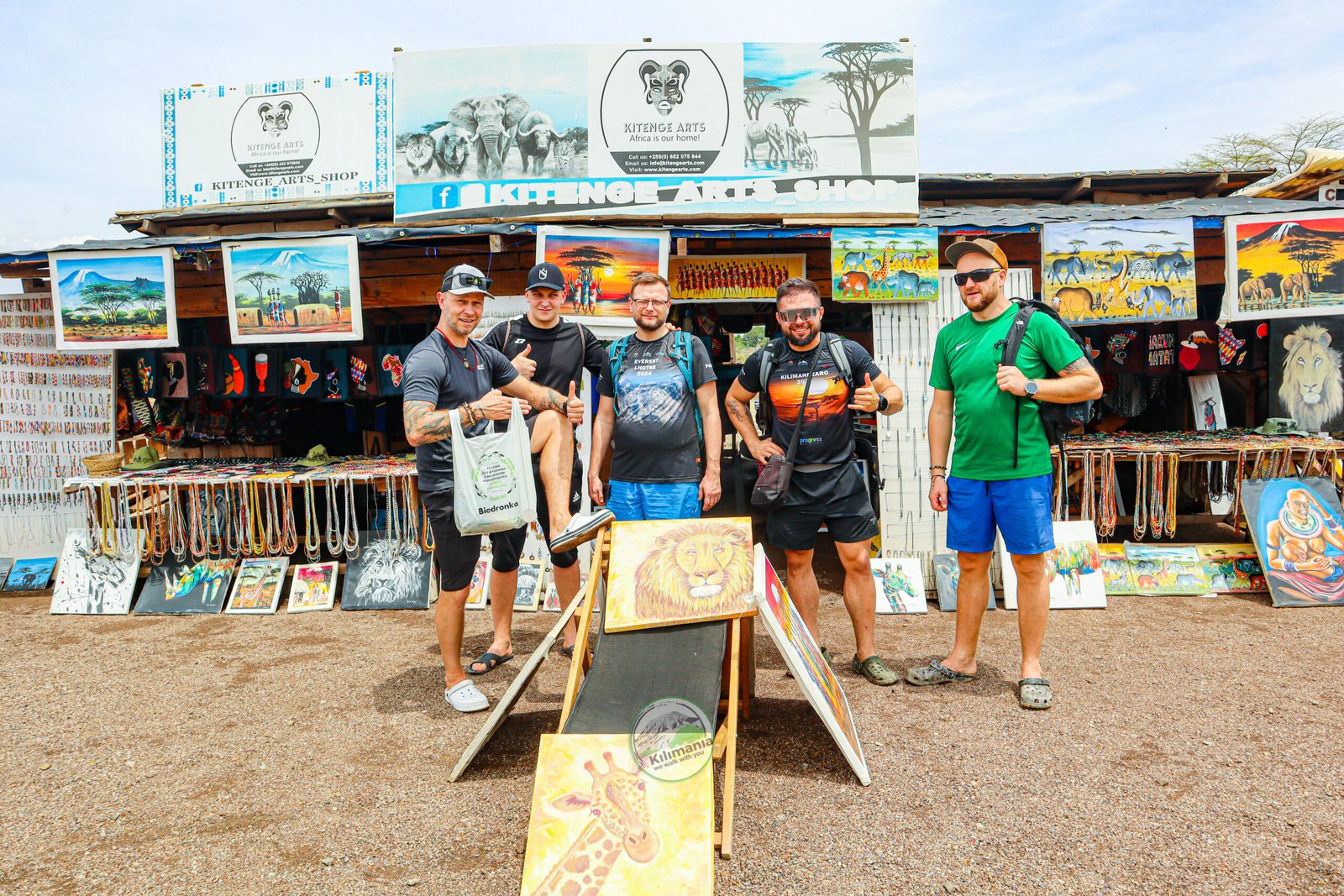 Group photo with kitenge fabric and local crafts near Chemka Hot Springs