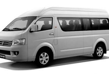 Silver high-roof minibus of the type used for Kilimanjaro Airport, Moshi and Arusha transfers