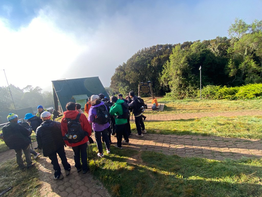 Hiking group resting at Mandara Hut on the Kilimanjaro day hike