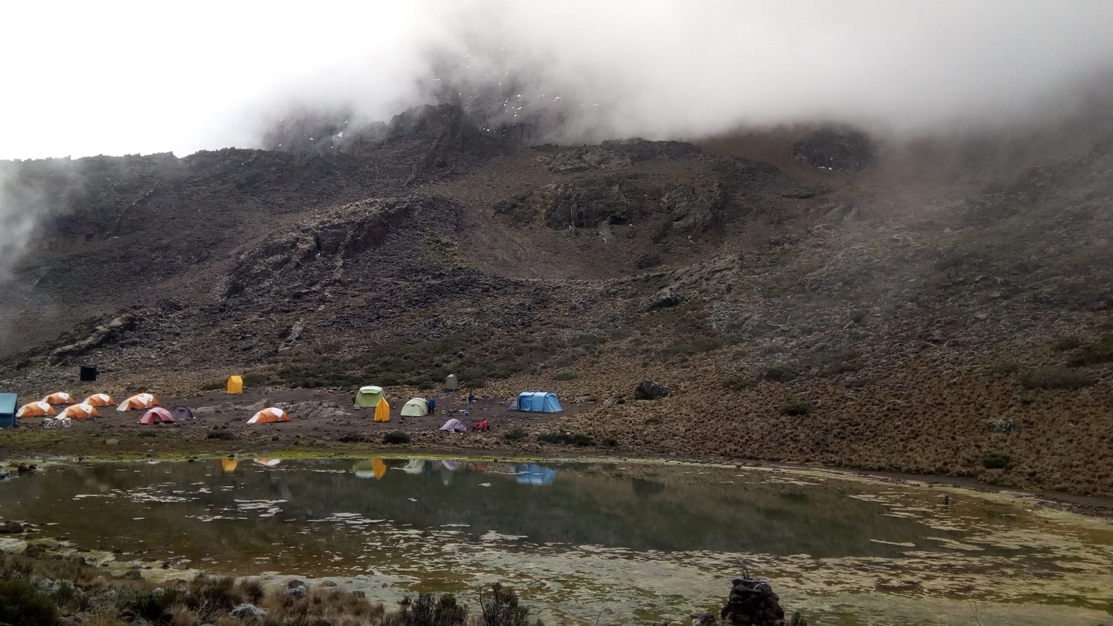 High-altitude camp beside an alpine lake on Kilimanjaro's northern Rongai side